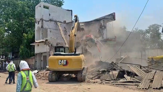 Bulldozer Roars for Road Widening (Photo: TAG)