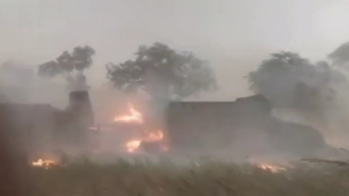Massive Fire Engulfs Homes Following Severe Storm