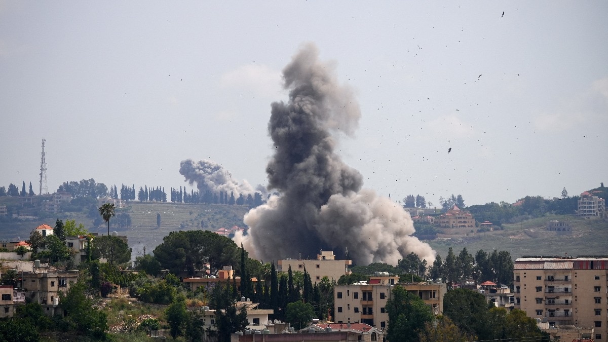 Smoke billows from southern Lebanon, following Israeli strikes, as seen from Nabatieh, Lebanon. 