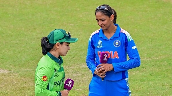 India's captain Harmanpreet Kaur (R) and her Pakistani counterpart Fatima Sana in this frame. (Getty)