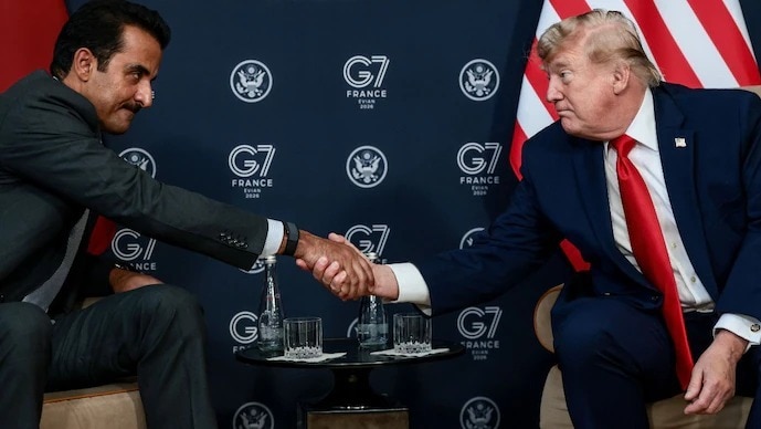 6a312d5d83eb7-us-president-donald-trump-shakes-hands-with-the-emir-of-qatar-160247890-16x9.png
