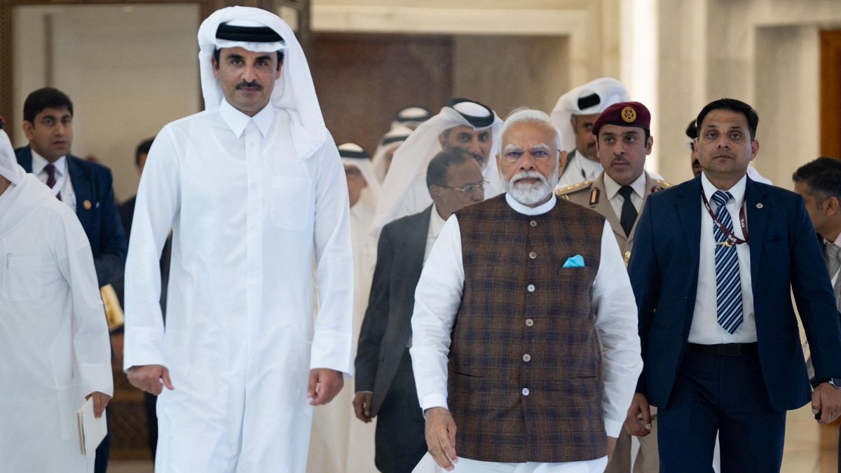 Prime Minister Narendra Modi and Qatar's Emir Sheikh Tamim bin Hamad Al Thani during the former's visit to Doha in February 2024. (Reuters photo)
