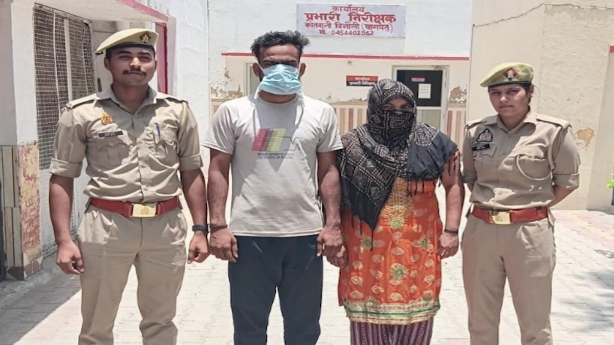 पुलिस गिरफ्त में आरोपी निशा और उसका प्रेमी. (photo: Screengrabs)