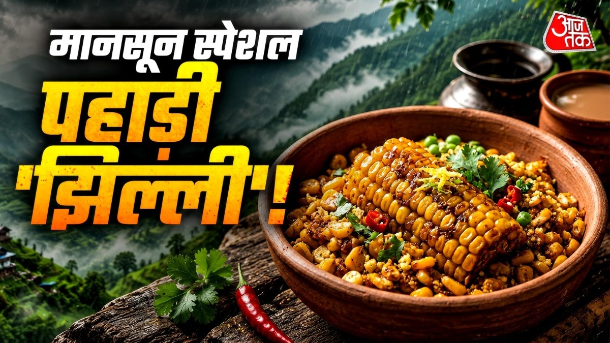 बारिश में भुट्टा खाने का अलग मजा आता है. (PHOTO:AI)