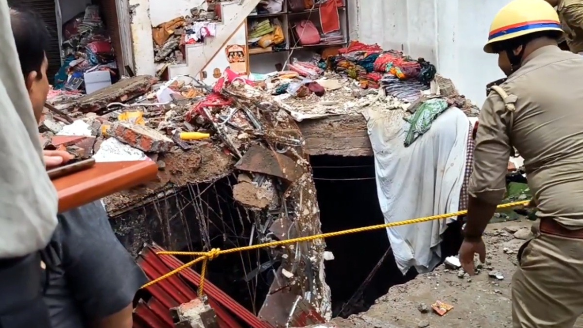Woman missing after shop collapses 