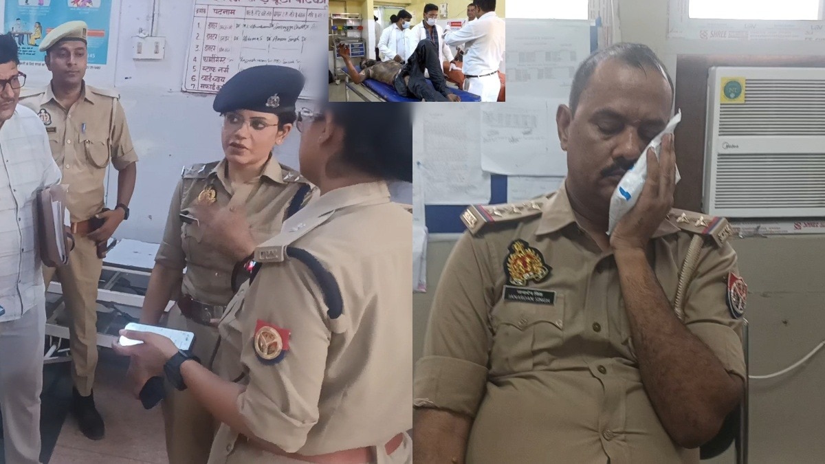 शख्स को बचाने में झुलसे पुलिसवाले (Photo- ITG) 