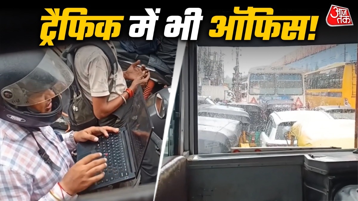 man-opens-laptop-on-bike-during-traffic-jam-video-goes-viral