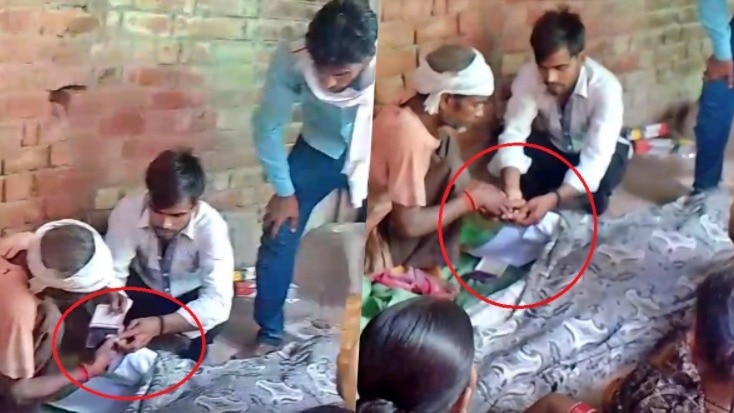 पिता के शव के साथ बेटे ने की शर्मनाक हरकत (Photo- Screengrab) 