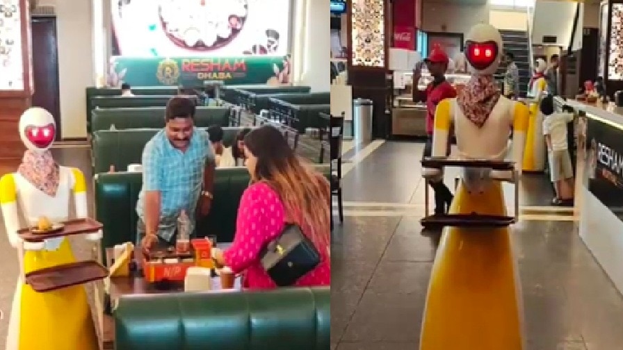 कस्टमर को फूड सर्व करता रोबोट. (Photo: Screengrabs)