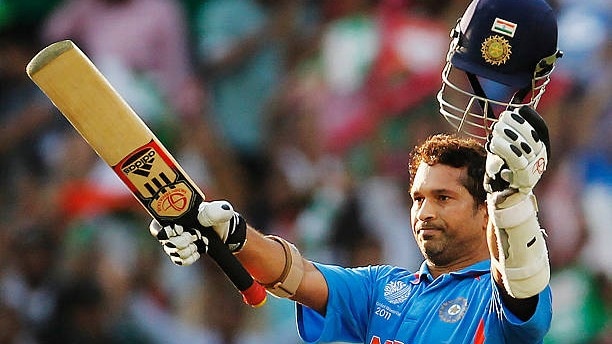 Sachin Tendulkar of India raises his bat