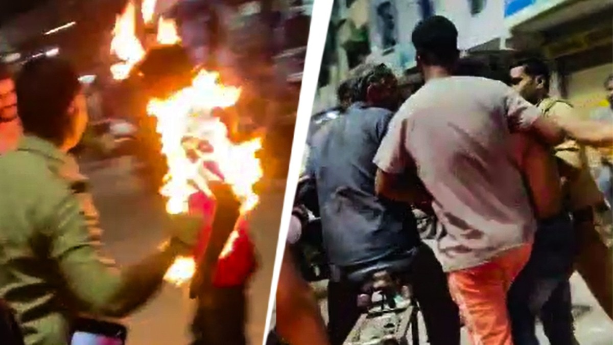 पुलिस चौकी के बाहर युवक ने खुद को लगाई आग. (Photo: Screengrab)