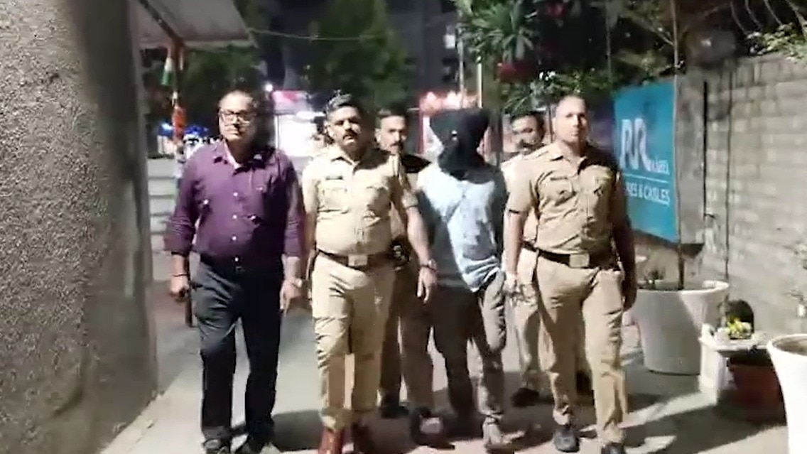 पुलिस गिरफ्त में आरोपी पति. (Photo: Screengrabs)