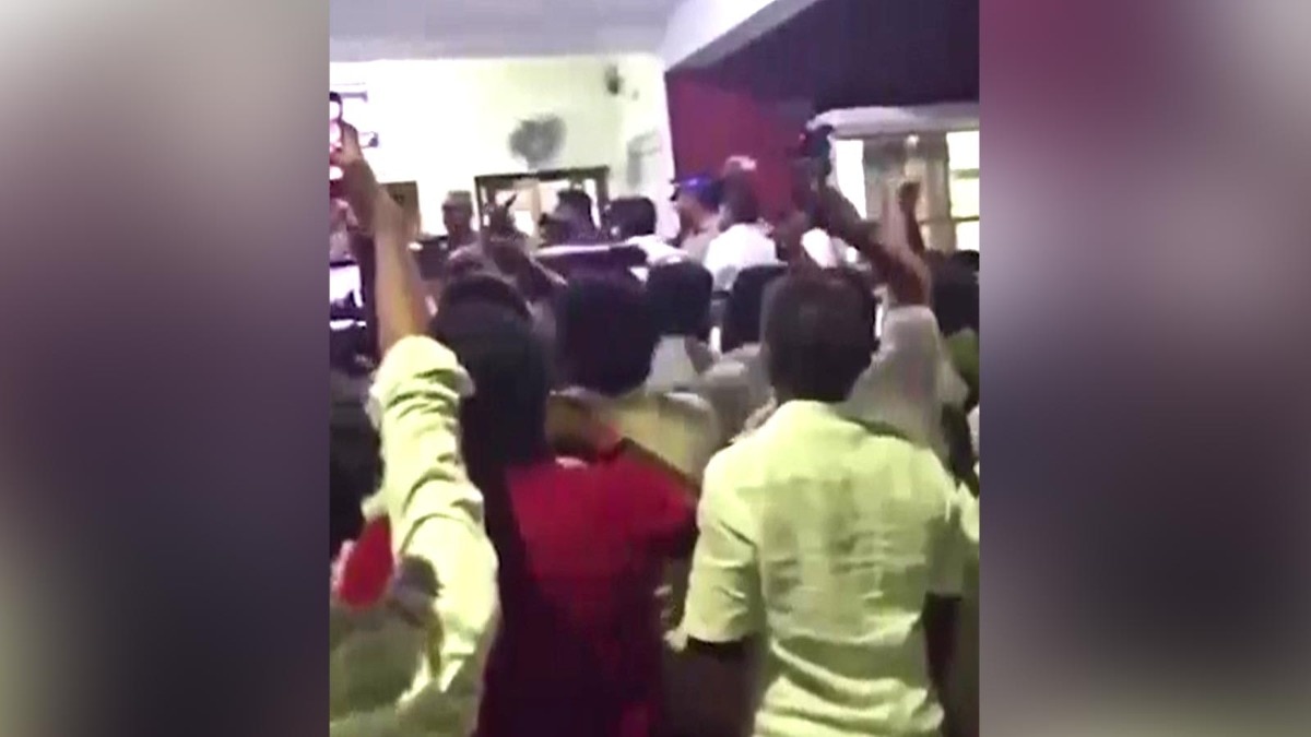 AIADMK workers gheraoed the Dharapuram police station in Tamil Nadu on Saturday night. (Photo: ITG)