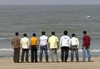 जुहू बीच पर युवती की लाश