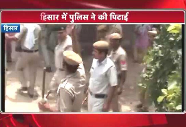 पुलिस से पिटे बाबा रामपाल के समर्थक