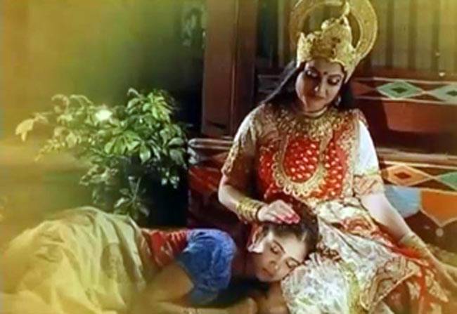 मां संतोषी की गोद में भक्त संतोषी