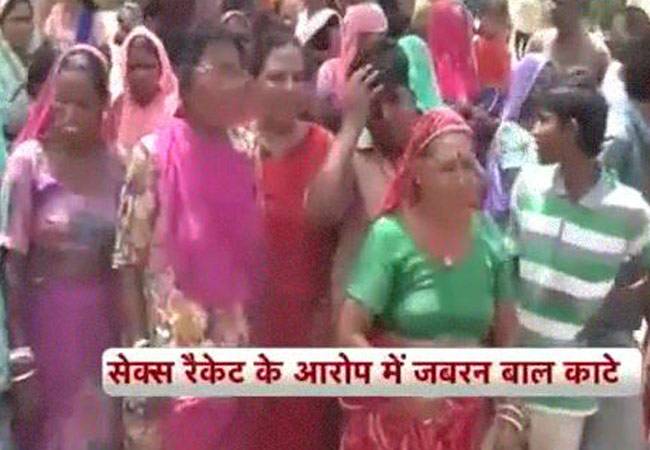 महिला की पिटाई