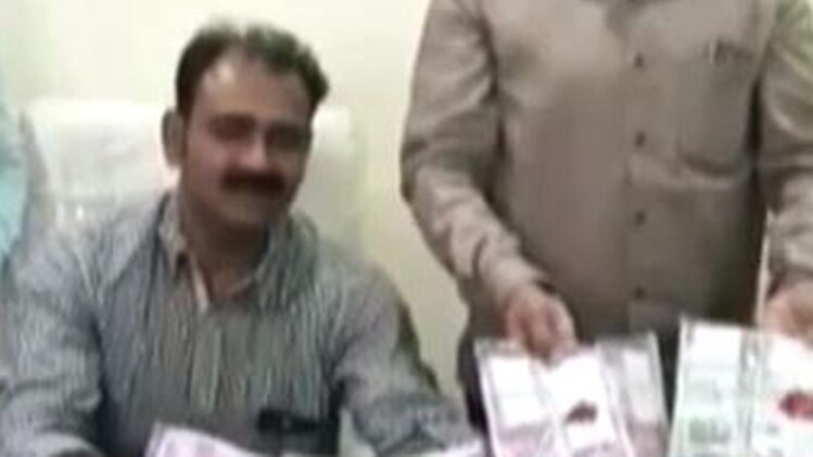 12 लाख रुपये बरामद