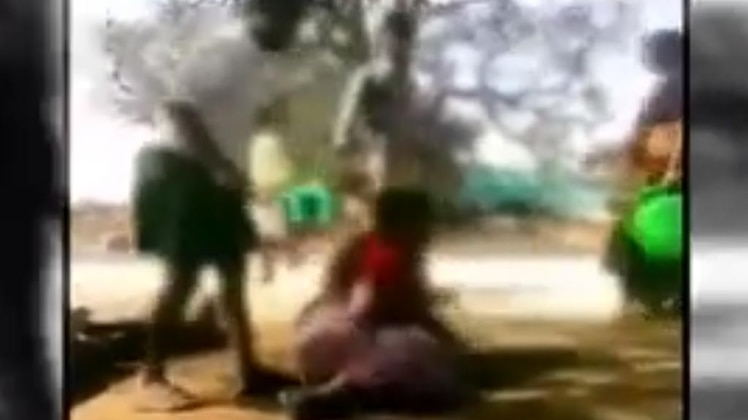 सरपंच ने महिला को पीटा