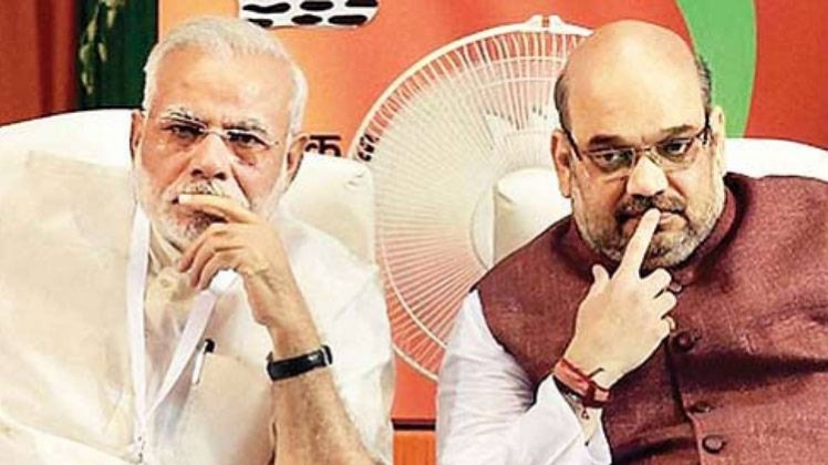 पीएम नरेंद्र मोदी के साथ अमित शाह (फाइल फोटो-PTI)