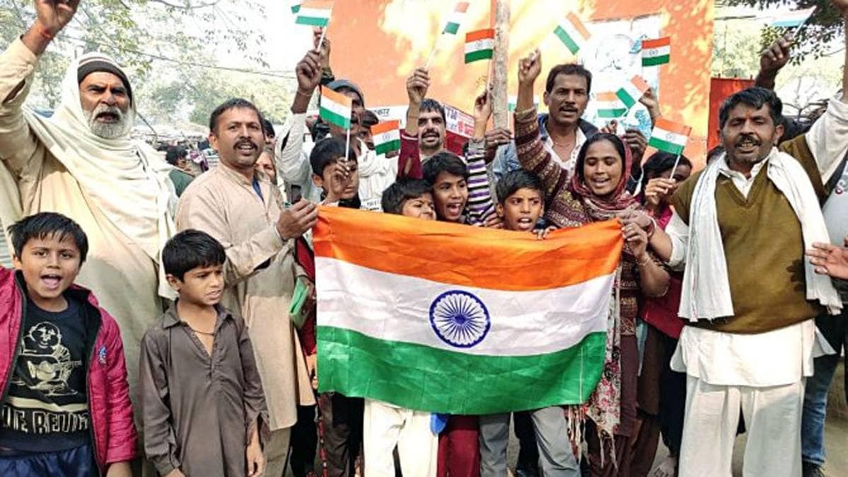 दिल्ली में मजनूं का टीला इलाके में जश्न का माहौल (Photo: ANI)