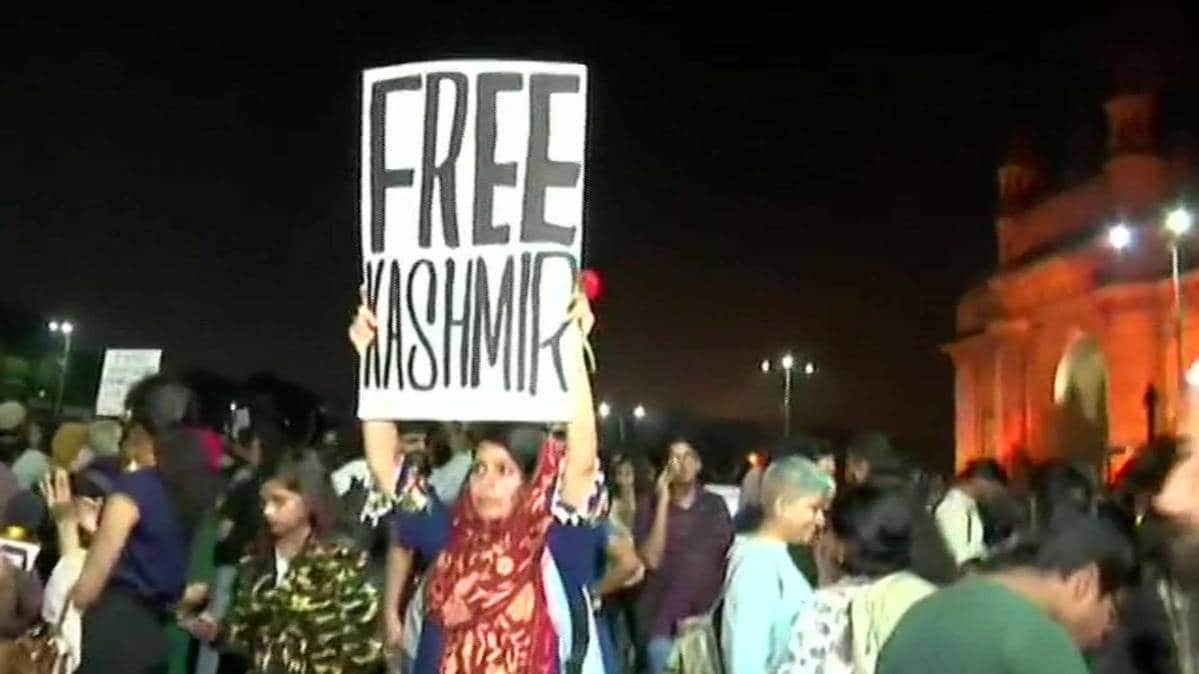 Mumbai: Poster reading, 'Free Kashmir' seen at Gateway of India, during protest against yesterday's violence at Delhi's Jawaharlal Nehru University. (Photo ANI)