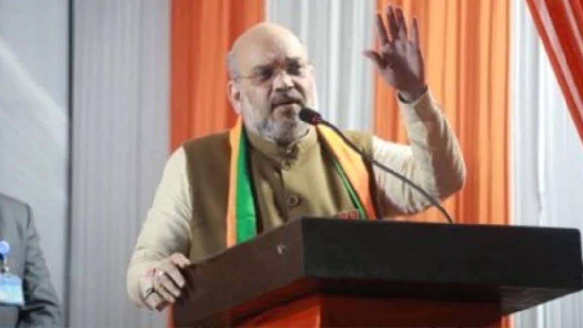 अमित शाह जवाहरलाल स्टेडियम में लोगों को संबोधित करते हुए (फाइल- ट्विटर/अमित शाह)