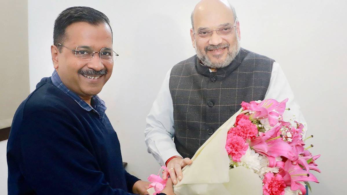 अमित शाह संग अरविंद केजरीवाल (PTI)