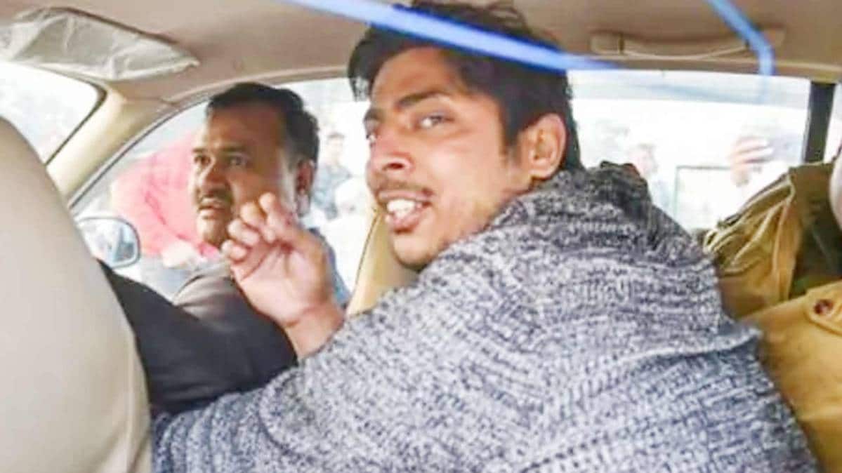 पुलिस हिरासत में कपिल गुज्जर (फोटो-पीटीआई)