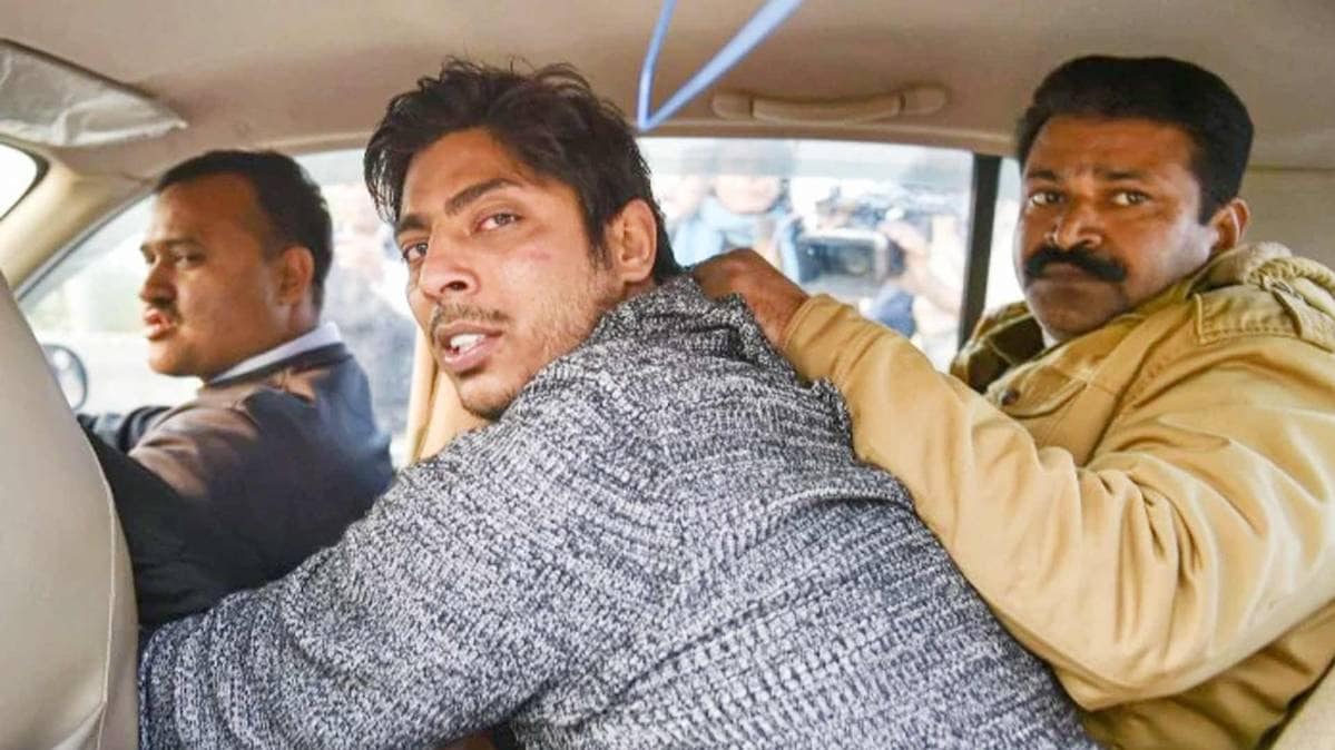 Kapil Gujjar being taken away by police from Shaheen Bagh protest site on February 1 | India Today