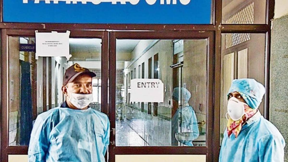 Medics outside an isolation ward of coronavirus at Gandhi Hospital in Hyderabad on Monday