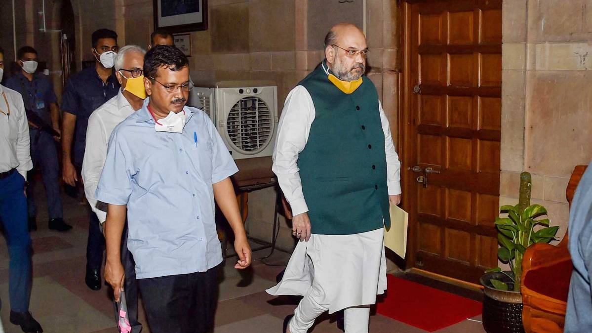 गृह मंत्री अमित शाह और दिल्ली के सीएम केजरीवाल (फोटो-PTI)