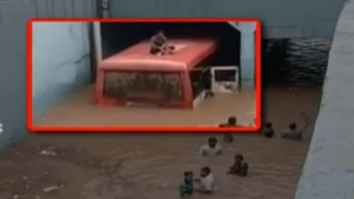 Bus immersed in rain water (File- Video Grab)