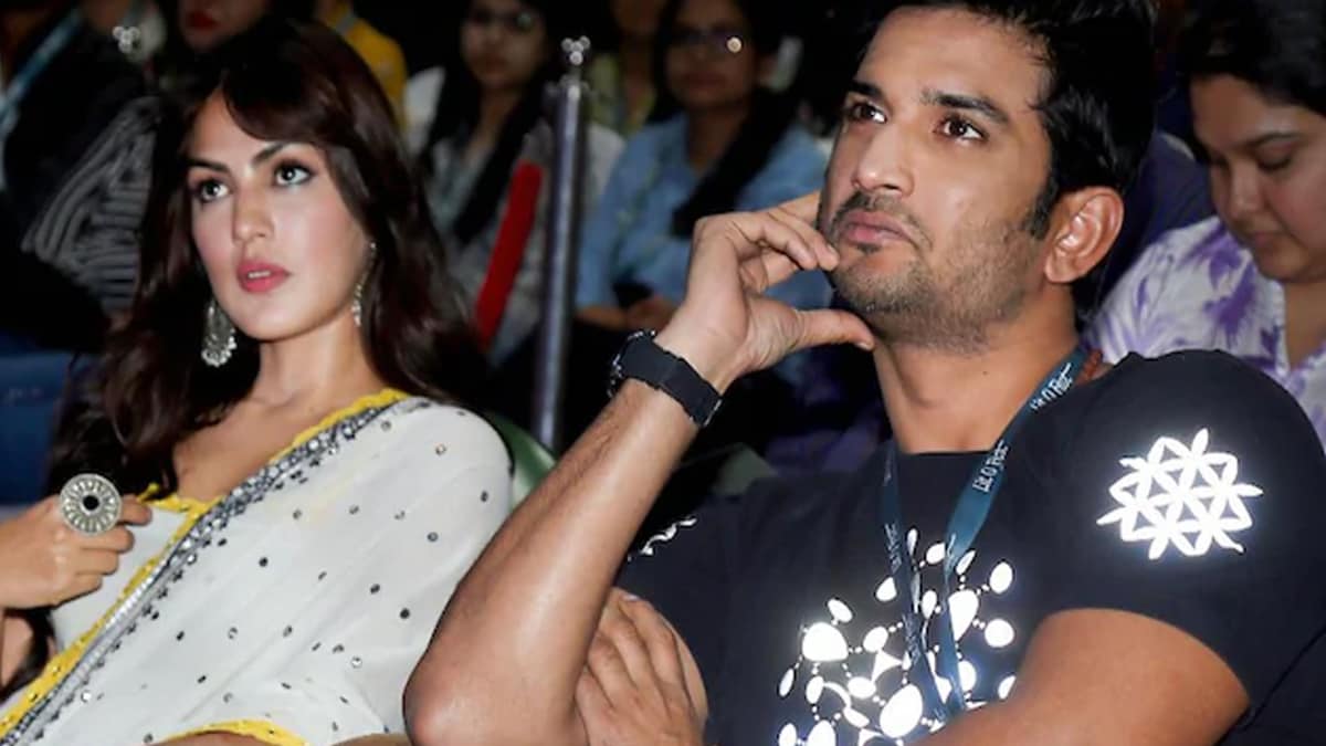 Suhsant singh with Rhea Chakroborty (Photo-PTI)