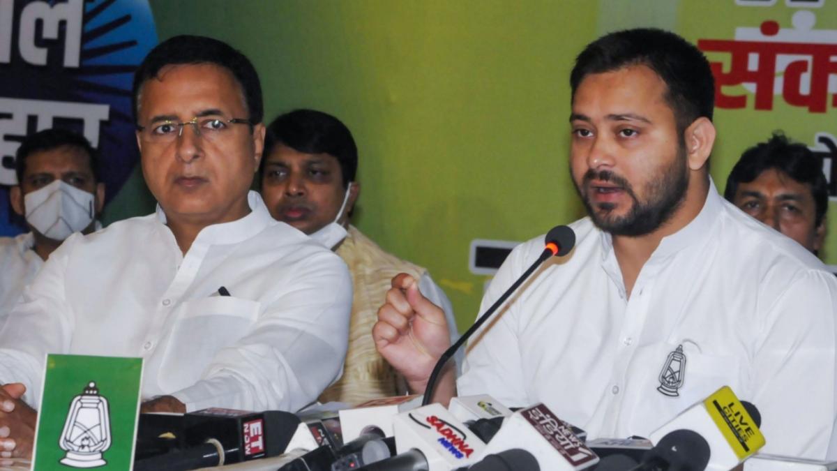 Randeep Surjewala and Tejashwi Yadav (File-PTI)