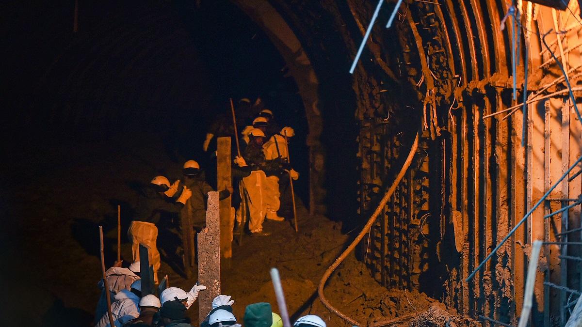 Four JCBs have removed debris from the Tapovan tunnel where at least 30 workers are trapped (Source: PTI)
