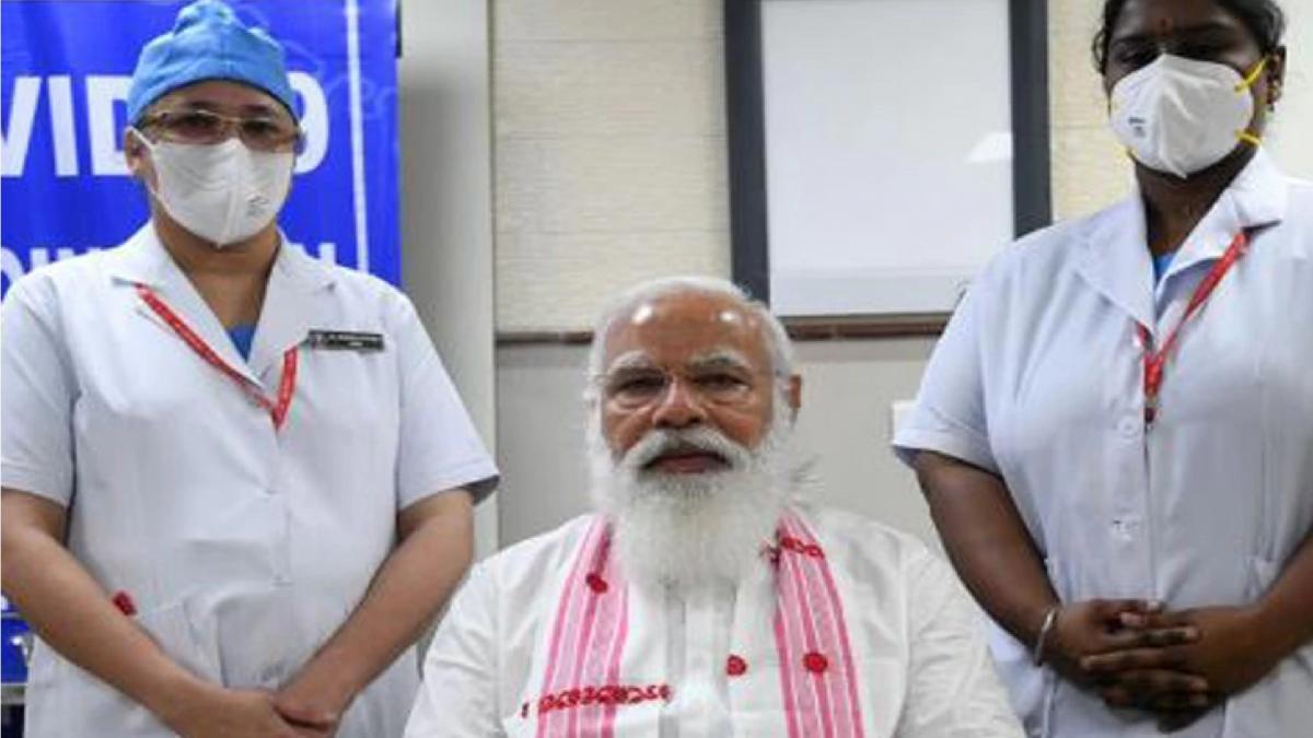 PM Narendra Modi with nurses