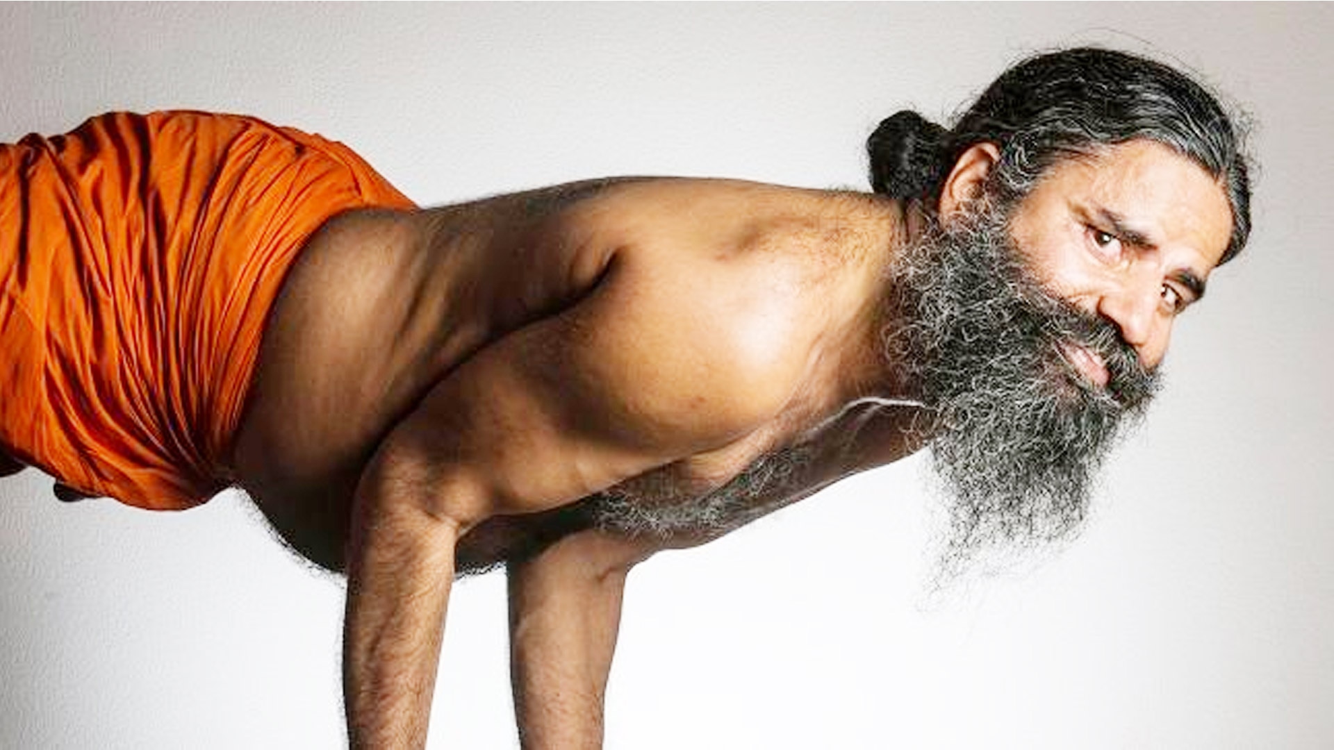 Ramdev explains yoga asanas