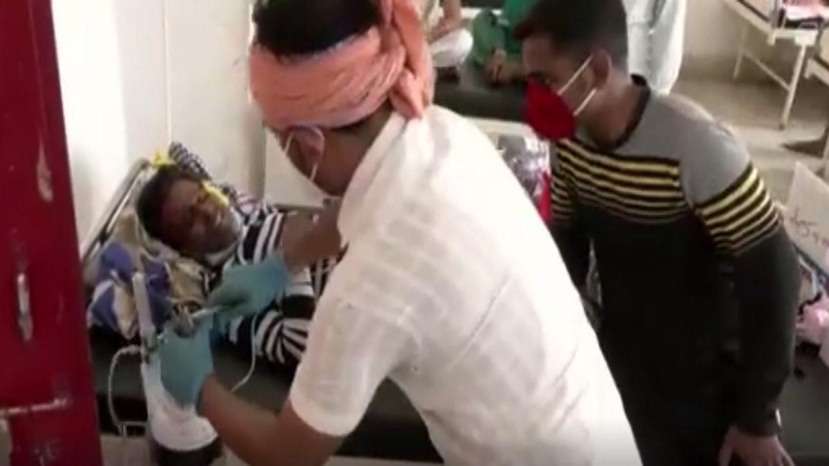 driver putting oxygen on patients