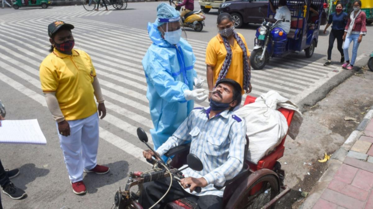 Medical worker collecting swab (File-PTI)