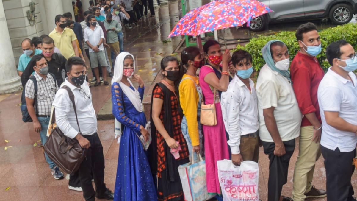 People wait in queue at Rajiv Chowk Metro station (File-PTI)