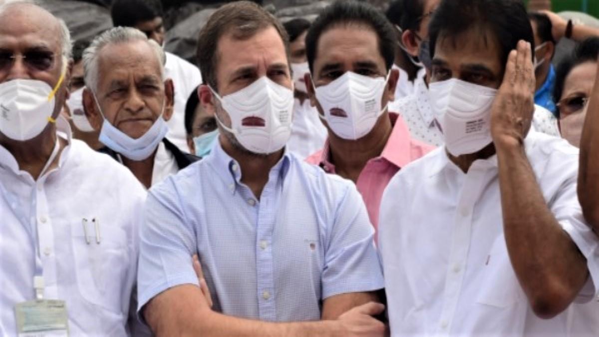 Rahul Gandhi with opposition leaders outside Parliament