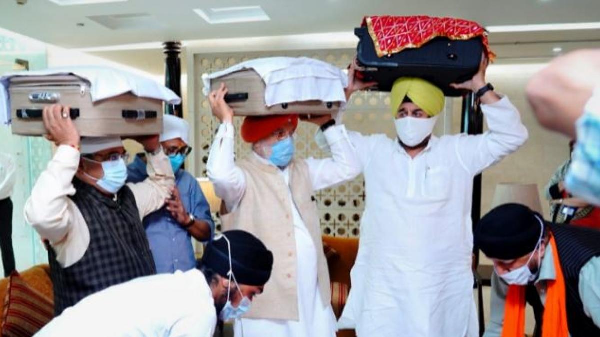 copies of Sikh scripture flown in from Afghanistan