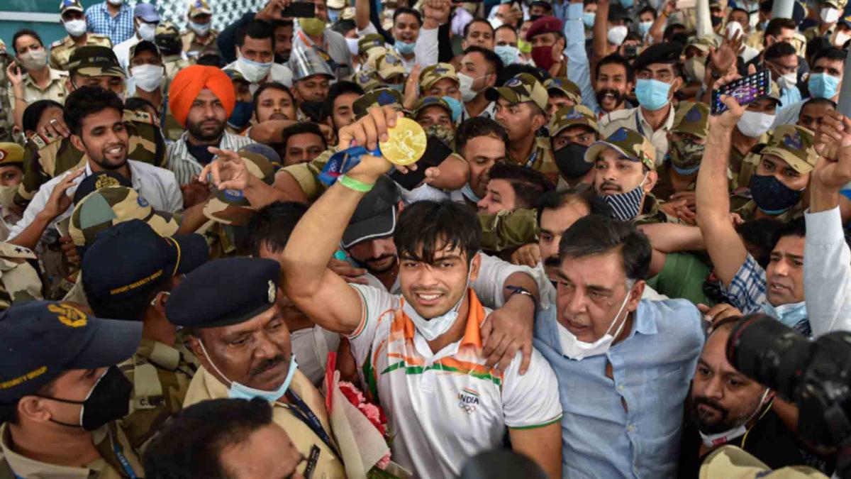 Gold medalist Neeraj Chopra being welcomed at IGI Airport