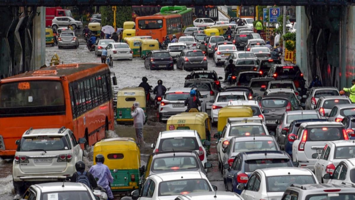 Delhi rain creates mayhem, vehicles ply on waterlogged street (File-PTI)