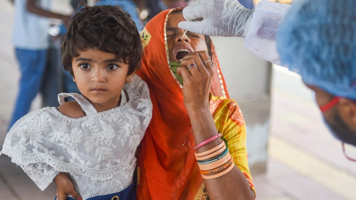 Health worker taking swab sample to test COVID-19 (Credit-PTI)