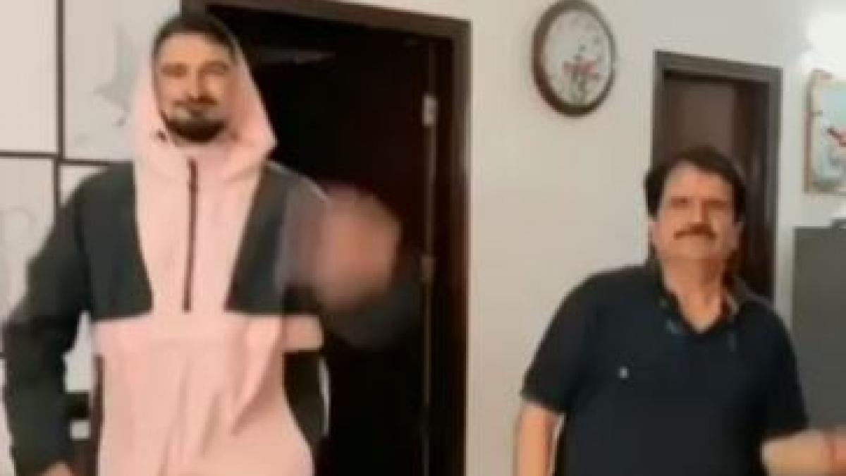 Funny dance of father and son