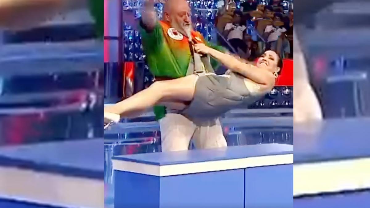 Man lifts woman with his beard