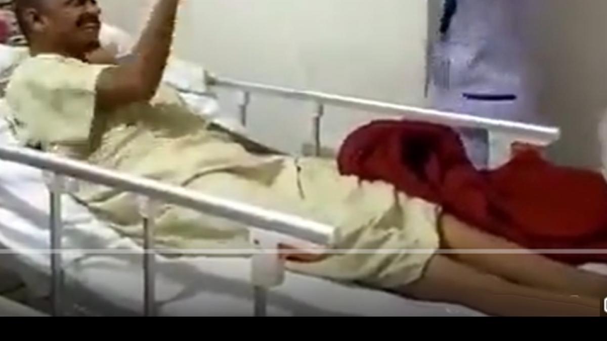 Nurse dances with patient