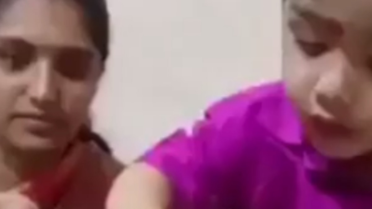 kid offering prasad to shivling